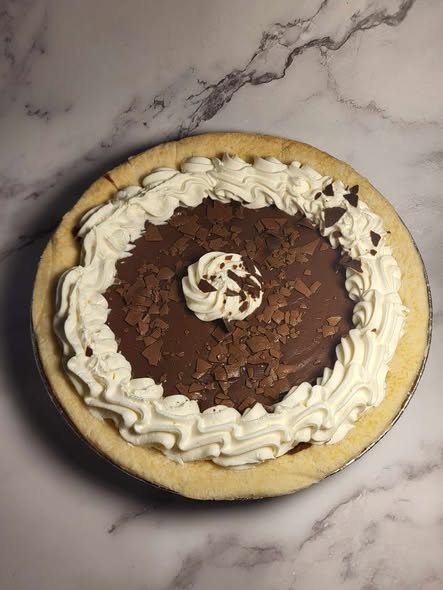 Tarte maison fraîchement préparée à la Boucherie Thibault